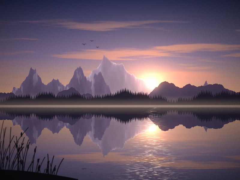 Snow-capped peaks and a row of pine trees reflected in a still lake at sunrise, reeds in the corner.